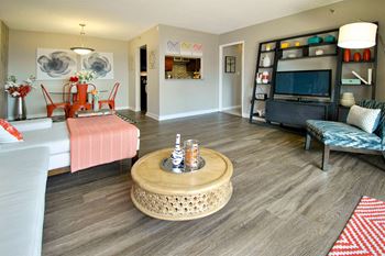 a living room with a couch and a tv